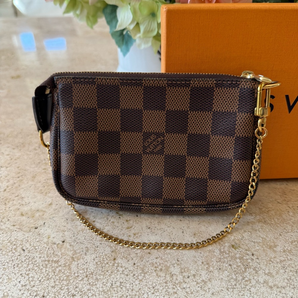 Authentic Louis Vuitton Mini Pochette in Damier Ebene